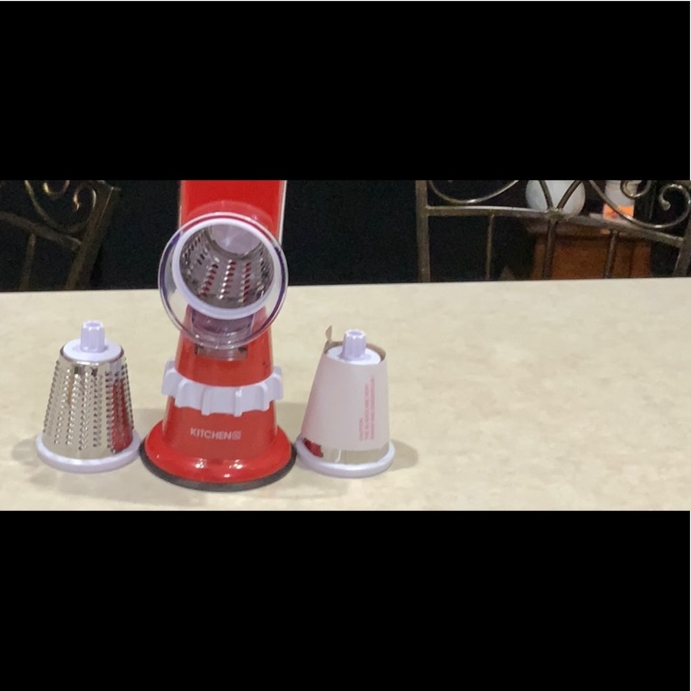 New never used Kitchen HQ grater and slicer with suction base .
